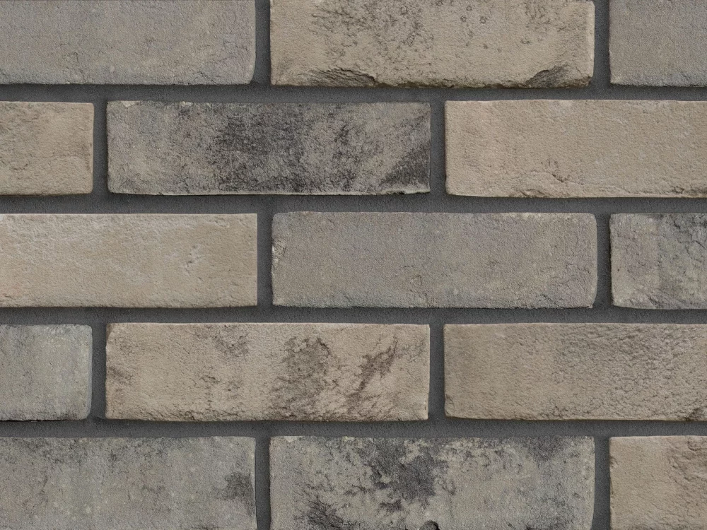 A light grey textured brick