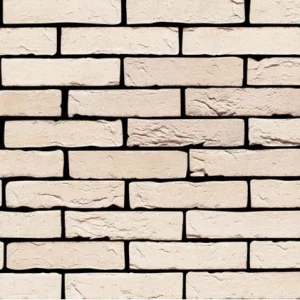 Close-up of a White wall featuring a white brick textured surface and uniform pattern.