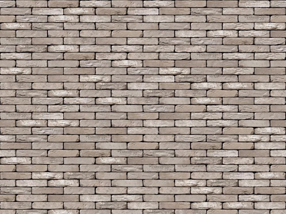 A uniform pattern of light grey brick sample