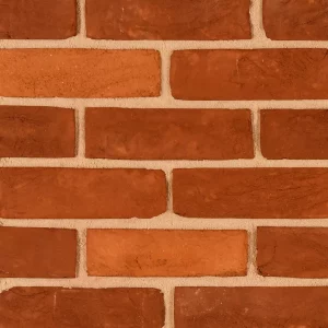 brick wall with red tones laid in a uniform pattern