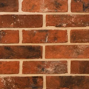Red brick wall sample laid in a uniform patter