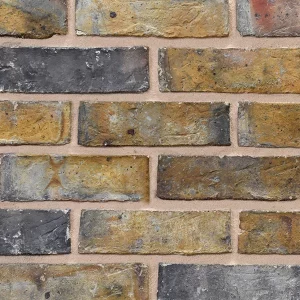 Brick wall sample displaying yellow, brown, and grey bricks in a horizontal layout with light mortar.