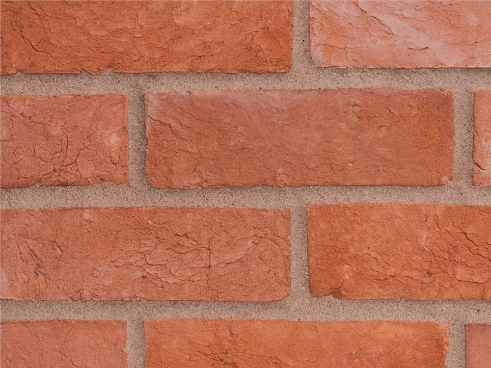 Red bricks laid in a traditional pattern with light mortar