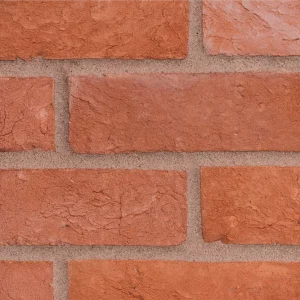 Red bricks laid in a traditional pattern with light mortar
