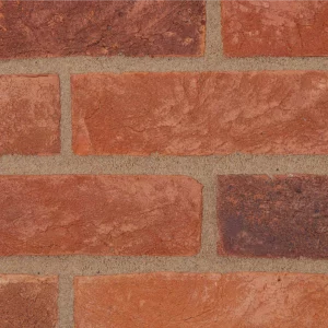 A red and orange brick and is laid in a traditional pattern with light mortar lines