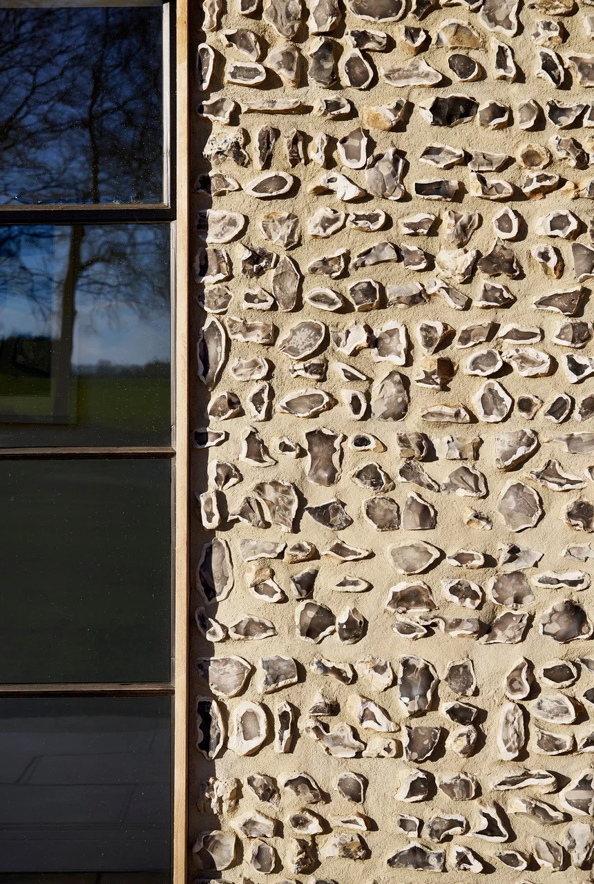 Flint block wall showing knapped flint types