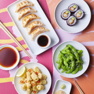 Yosushi meal. Crispy gyoza, suchi, edamame and deep fried quid.