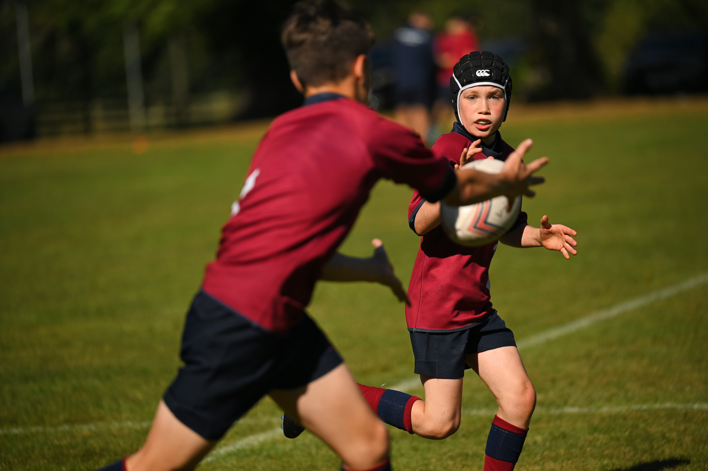 Pupils playing rugby at independent school in Buckinghamshire