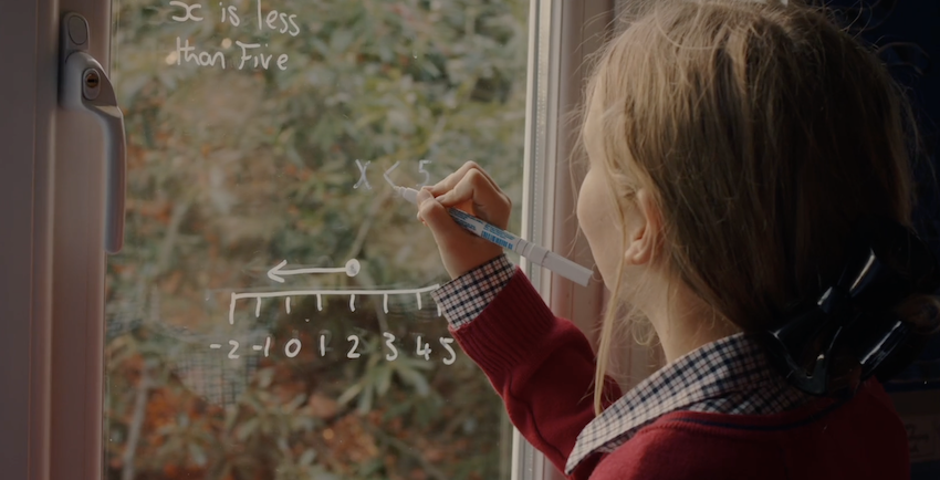 Pupils solving maths problems collaboratively at private school, Milton Keynes