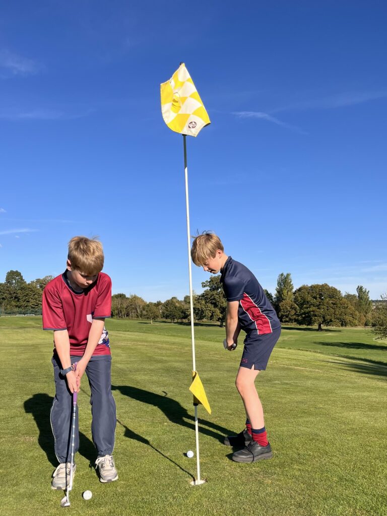 Swanbourne House pupils playing golf