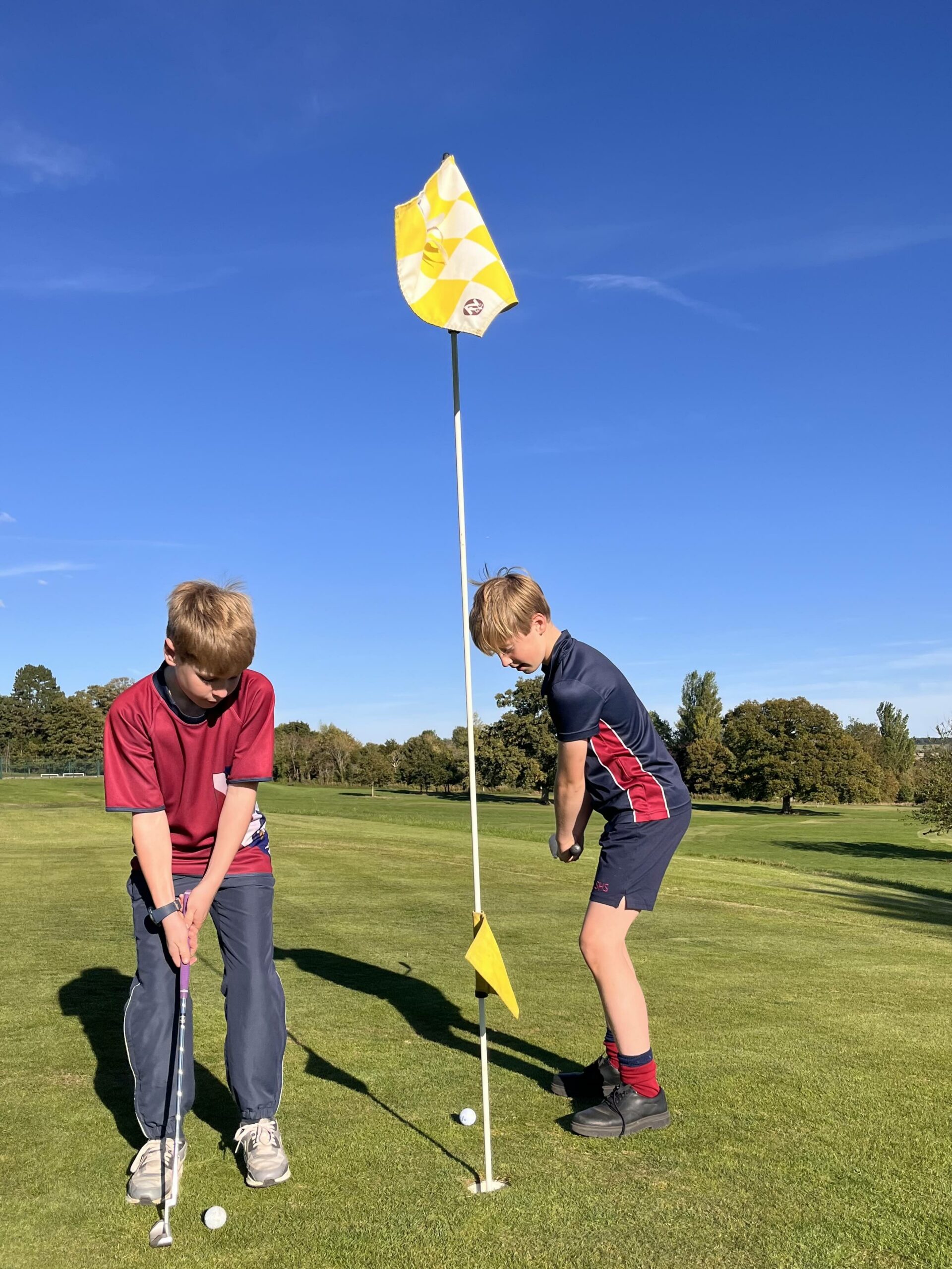 Swanbourne House pupils playing golf