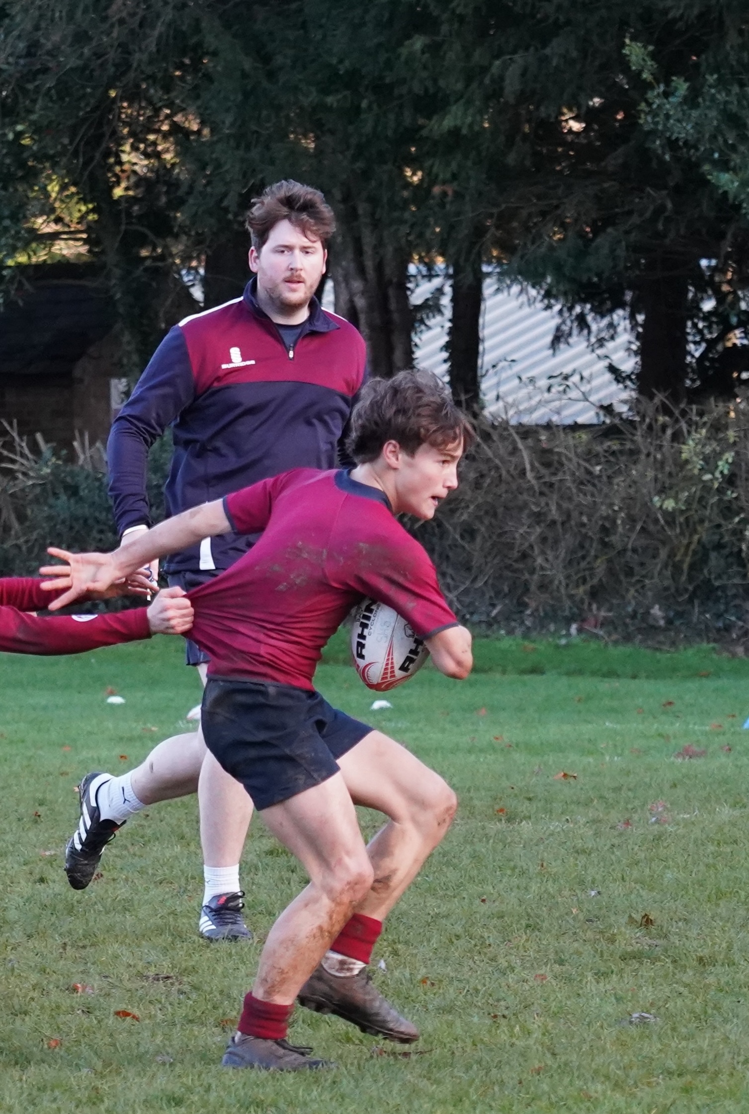 Boys playing rugby at Swanbourne House